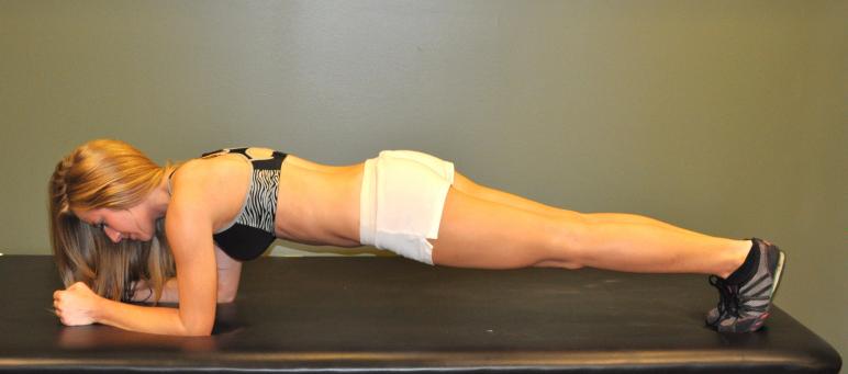 Plank w/ leg extension