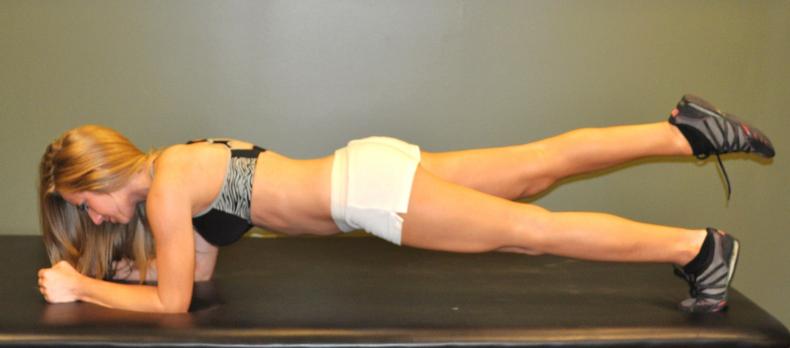 Plank w/ leg extension